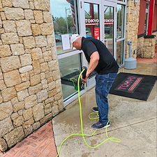 Top-Quality-Commercial-Pressure-Washing-Storefront-Cleaning-and-Window-Washing-Performed-in-Edgewater-FL 1